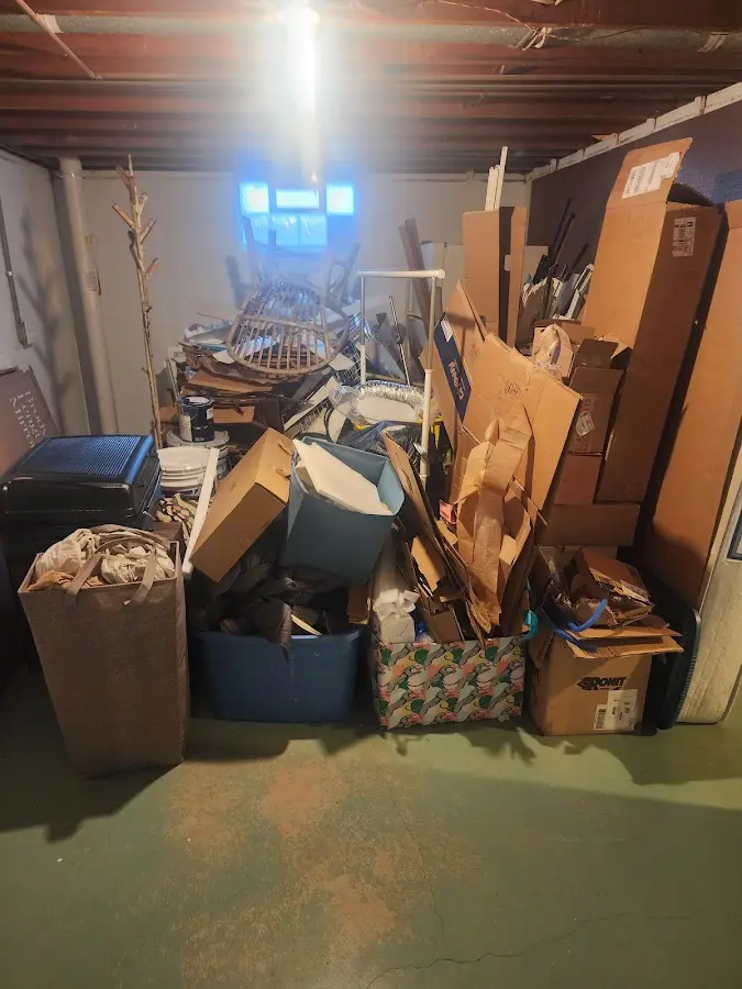 Roll-off dumpster container at job site for 2 Yard Dumpster Rental in Manchester